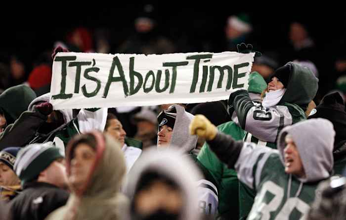 Jets' Fans hold up "It's About Time" sign in 2010